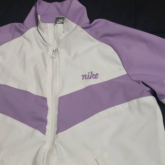 purple and white nike jacket